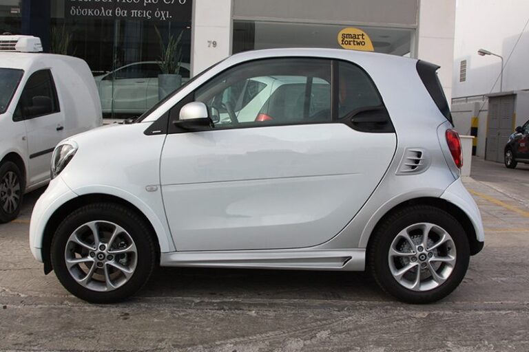 These are the Side Skirts for the Smart Fortwo 453, in Cool Silver Metallic color, brought to you by Smart Power Design. The Fender Flares are also installed.